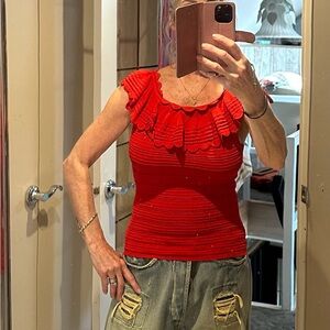 Alice + Olivia Vibrant Red Ruffled bandaid top can be worn off the shoulder.